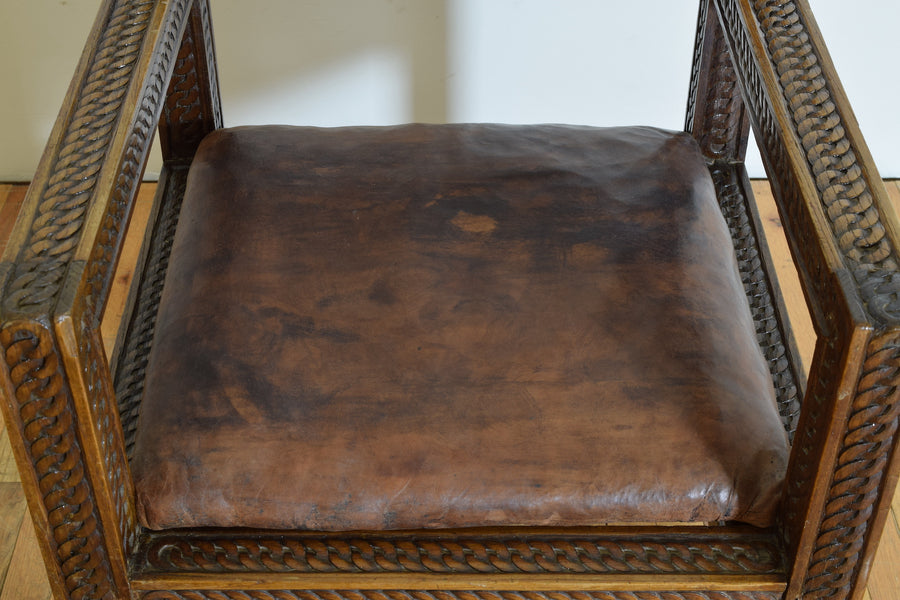 Carved Walnut and Leather Upholstered Armchair