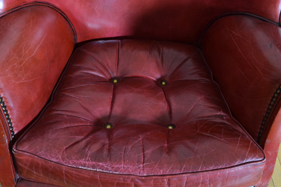 Mahogany and Leather Upholstered Swivel Wing Chair