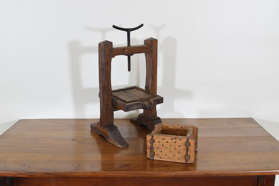 Wooden and Iron Cheese Press