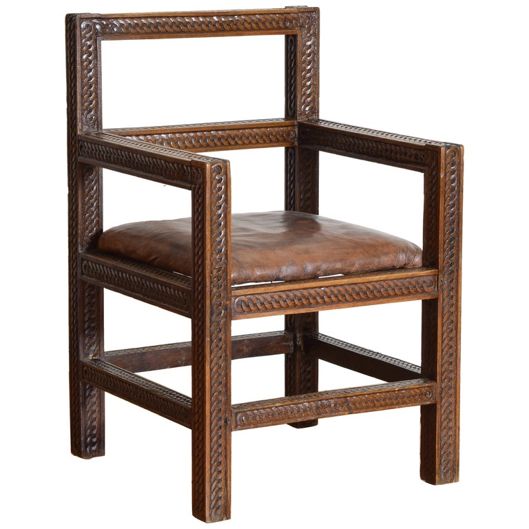 Carved Walnut and Leather Upholstered Armchair