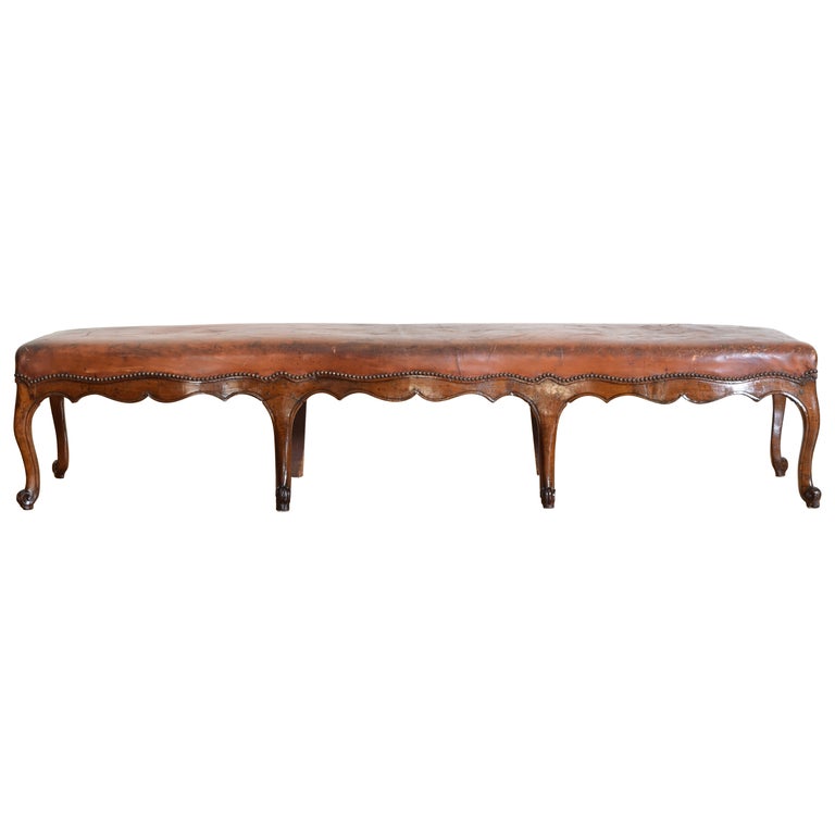 Carved Walnut and Leather Upholstered Bench