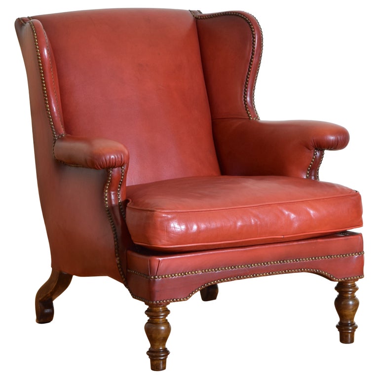 Walnut and Leather Upholstered Wing Chair
