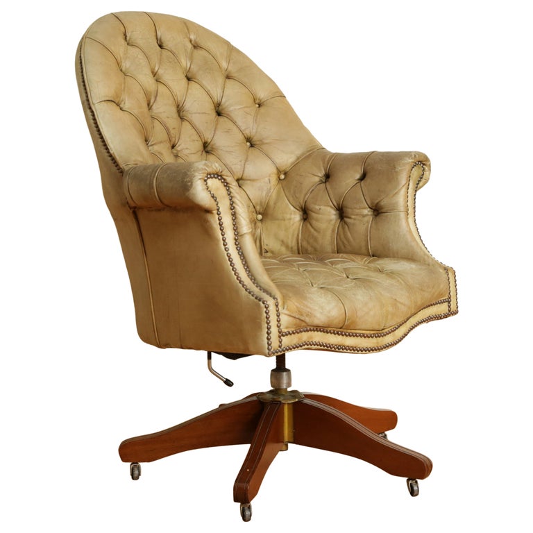 Tufted Leather and Mahogany Swivel and Tilt Desk Bergere