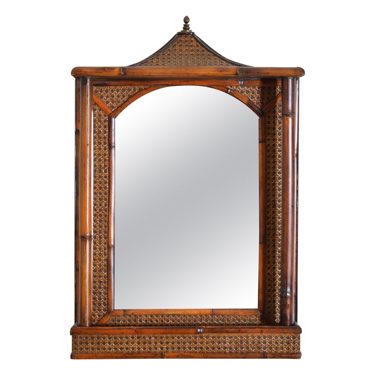 Rattan, Faux Bamboo, and Brass Pagoda Shaped Mirror