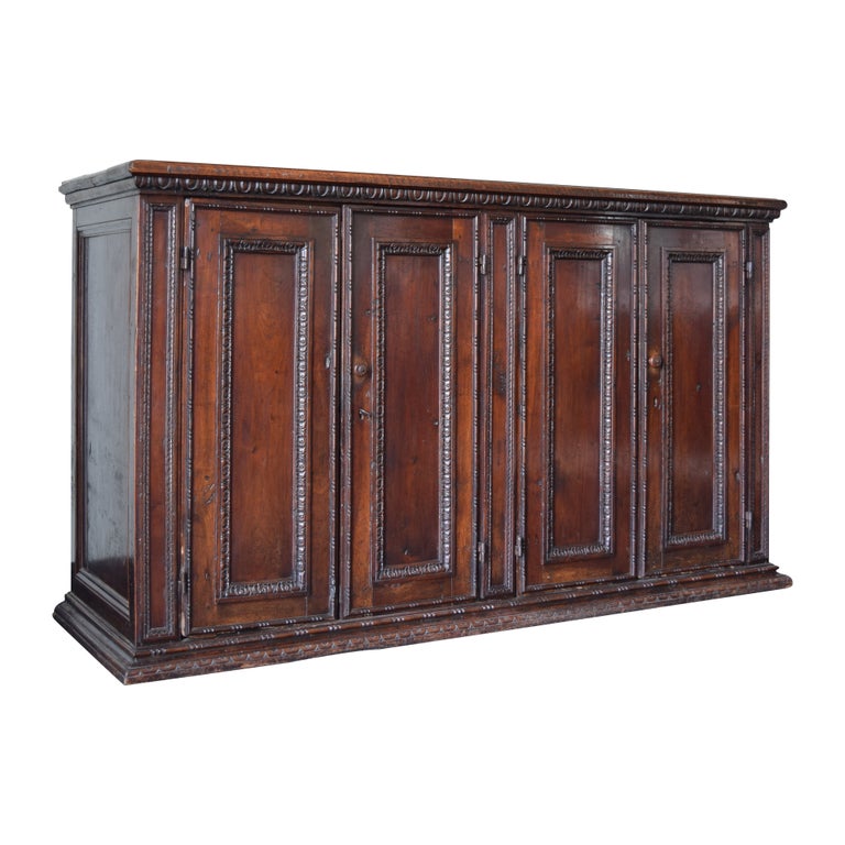 Carved Walnut 4-Door Credenza