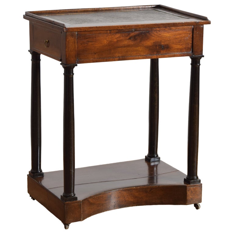 Walnut and Ebonized Stenciled Leather Writing Table