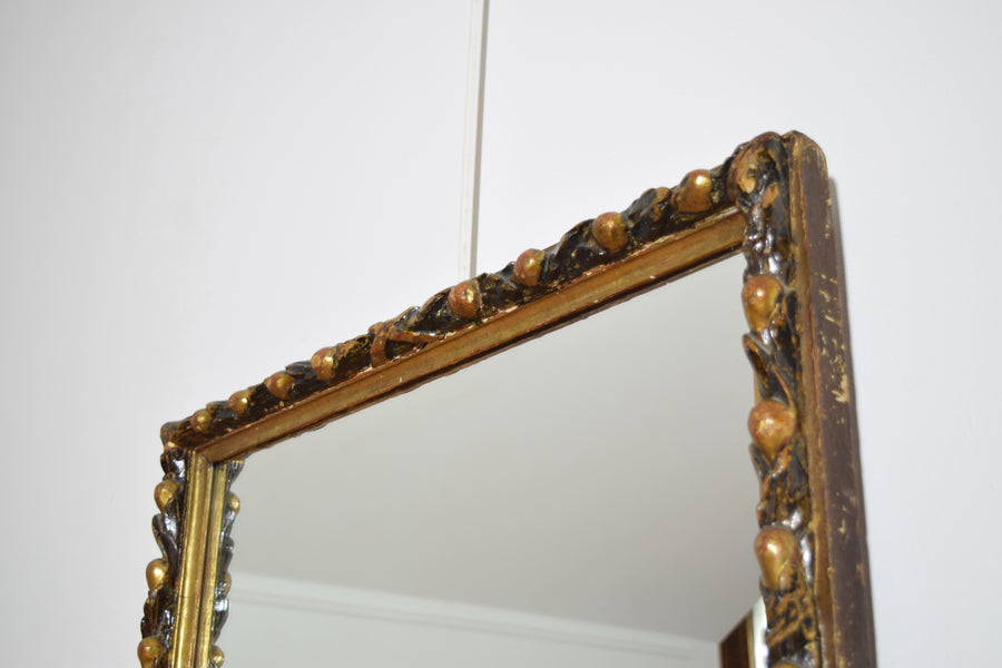 Carved Giltwood and Ebonized Mirror