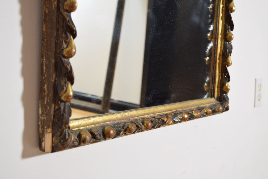 Carved Giltwood and Ebonized Mirror