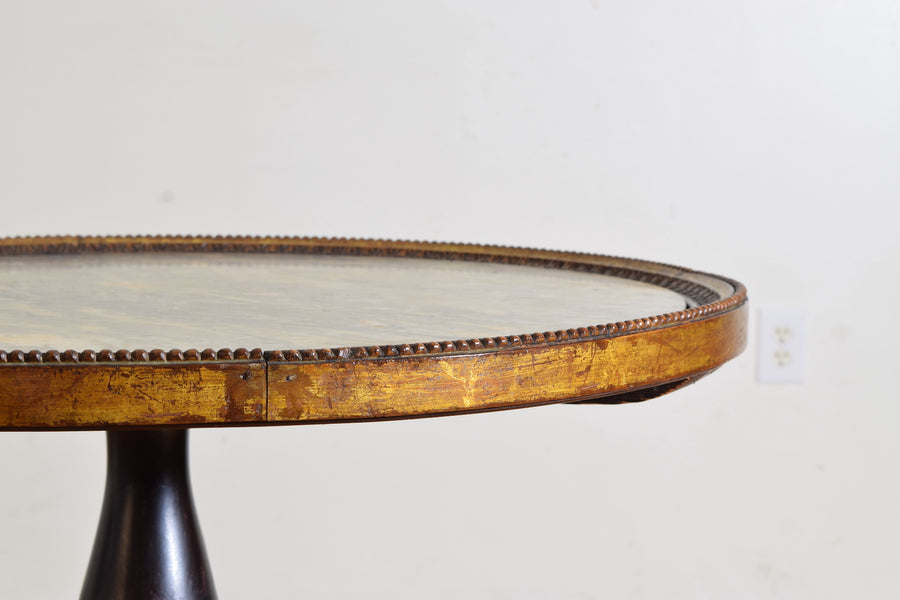 Carved Giltwood, Ebonized, and Marble-Top Center Table