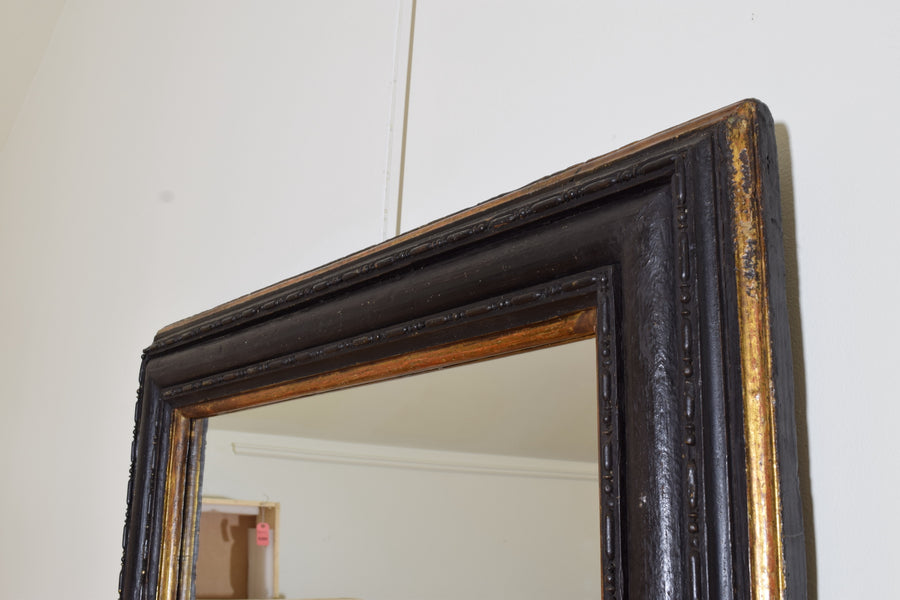 Carved, Ebonized, and Giltwood Molded Mirror