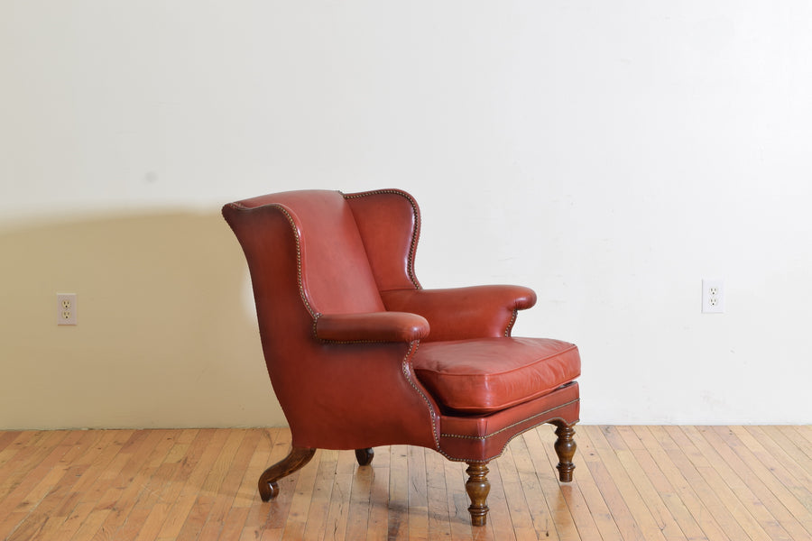 Walnut and Leather Upholstered Wing Chair