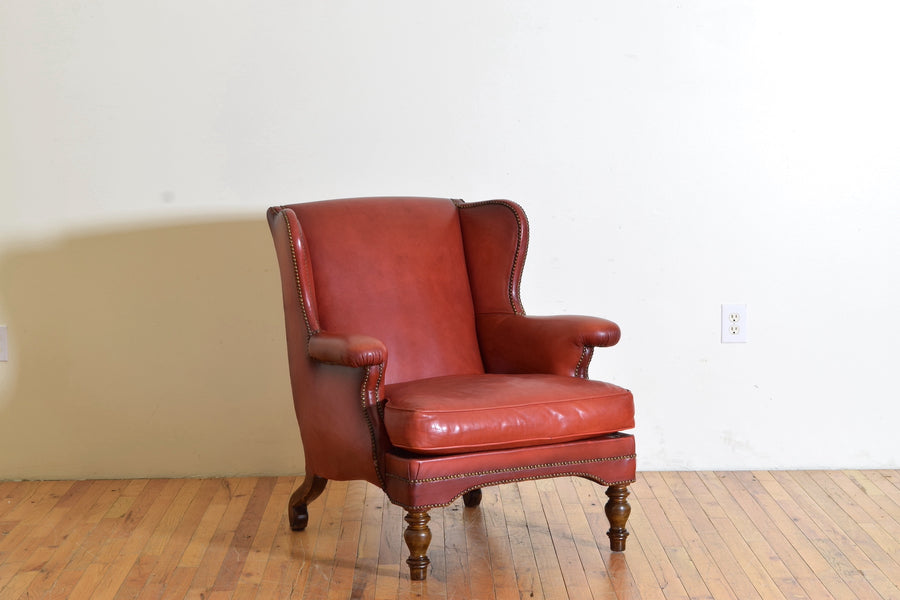 Walnut and Leather Upholstered Wing Chair