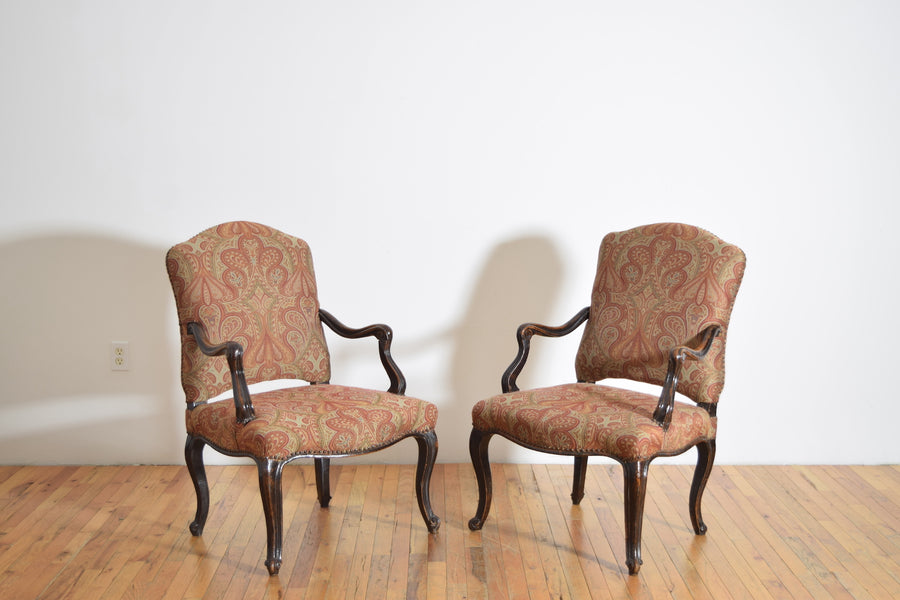 Pair of Poltrone in Carved Walnut