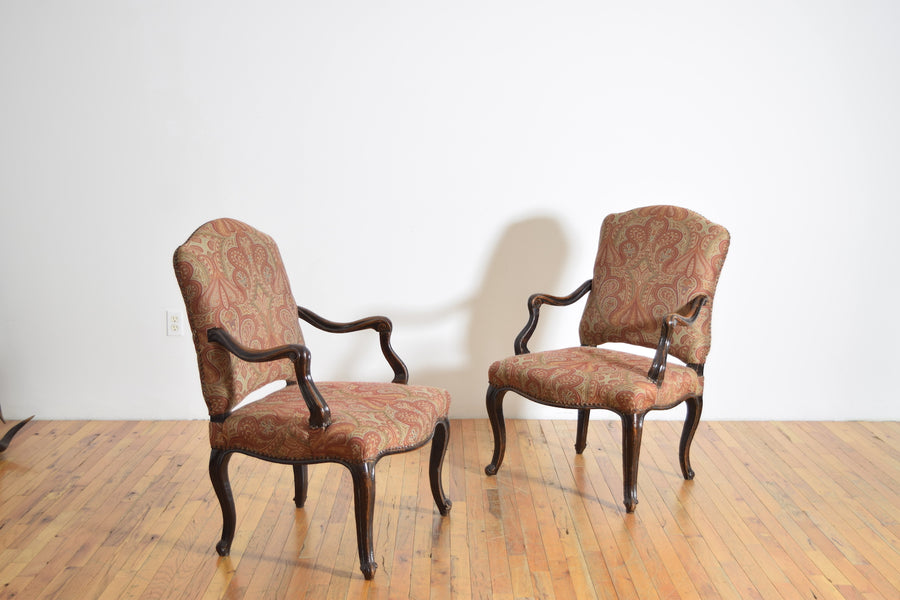 Pair of Poltrone in Carved Walnut
