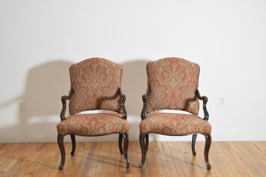 Pair of Poltrone in Carved Walnut