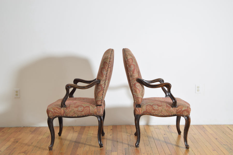 Pair of Poltrone in Carved Walnut