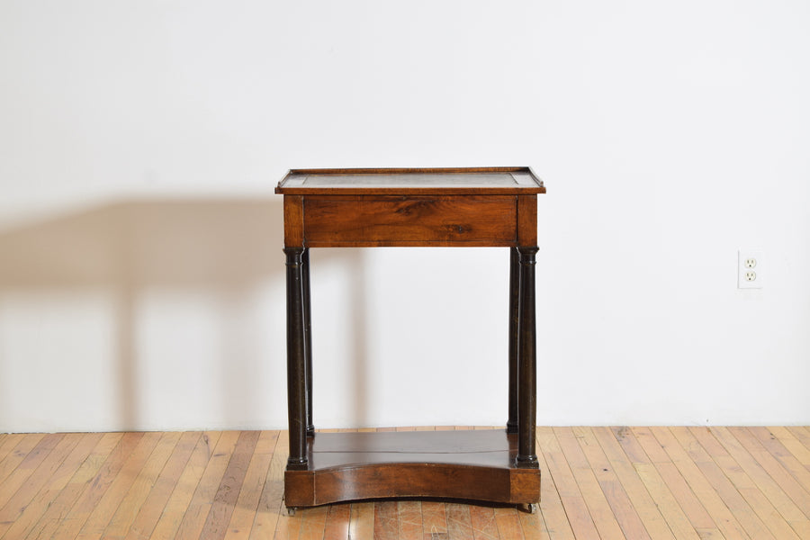 Walnut and Ebonized Stenciled Leather Writing Table