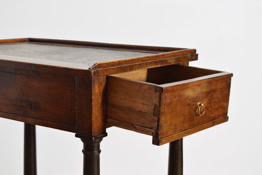 Walnut and Ebonized Stenciled Leather Writing Table