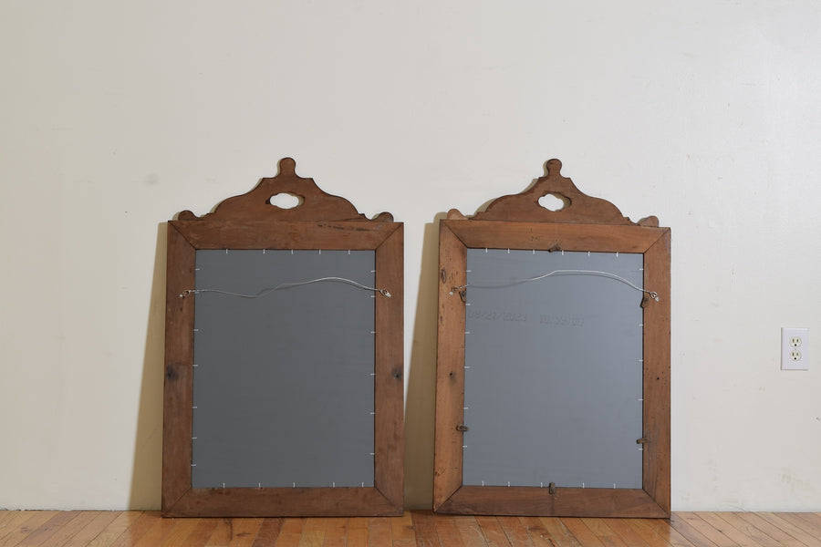 Pair of Shaped Walnut Mirrors