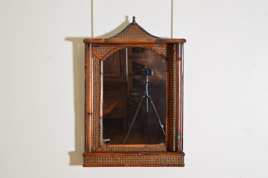 Rattan, Faux Bamboo, and Brass Pagoda Shaped Mirror