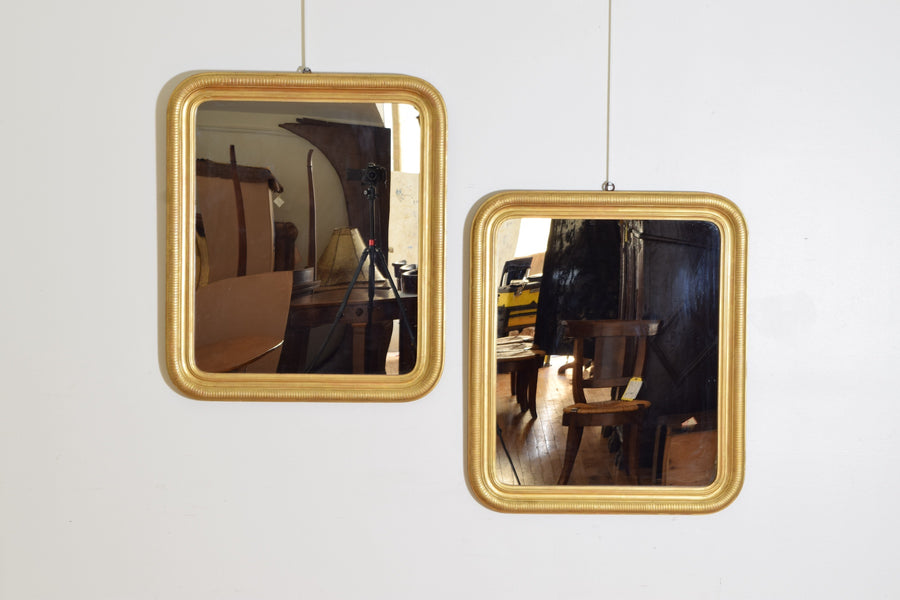 Pair of Carved Giltwood and Gesso Mirrors