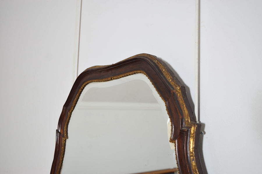 Shaped Walnut and Giltwood Mirror