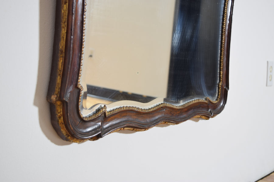 Shaped Walnut and Giltwood Mirror