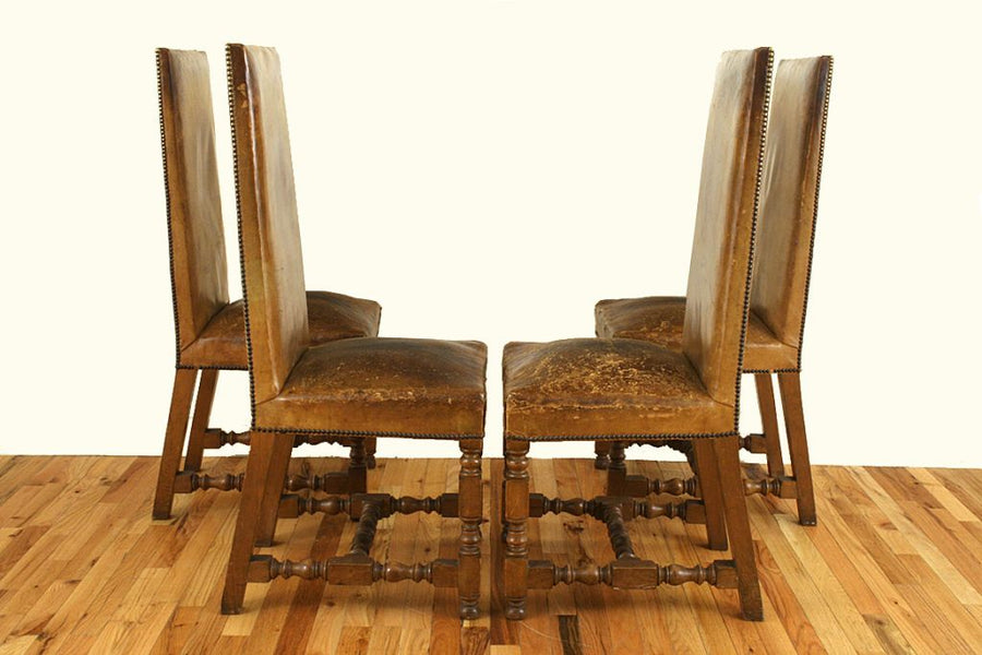 Four Walnut and Leather Upholstered Dining Chairs