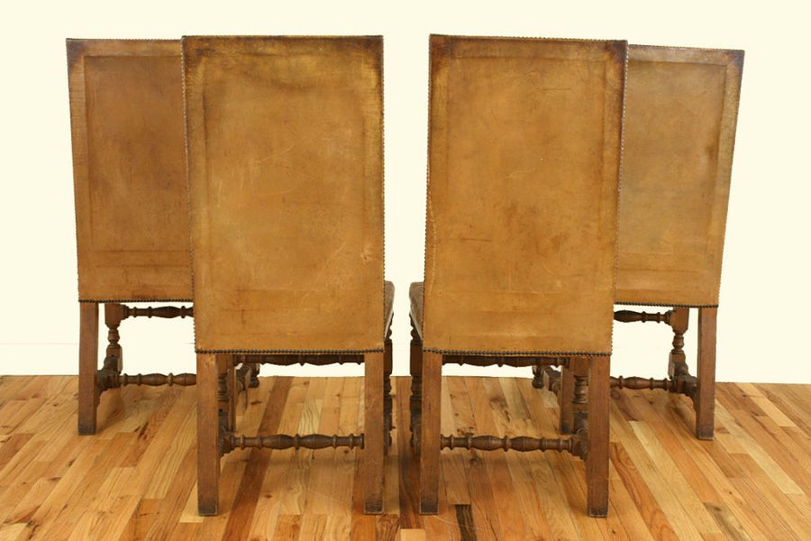 Four Walnut and Leather Upholstered Dining Chairs