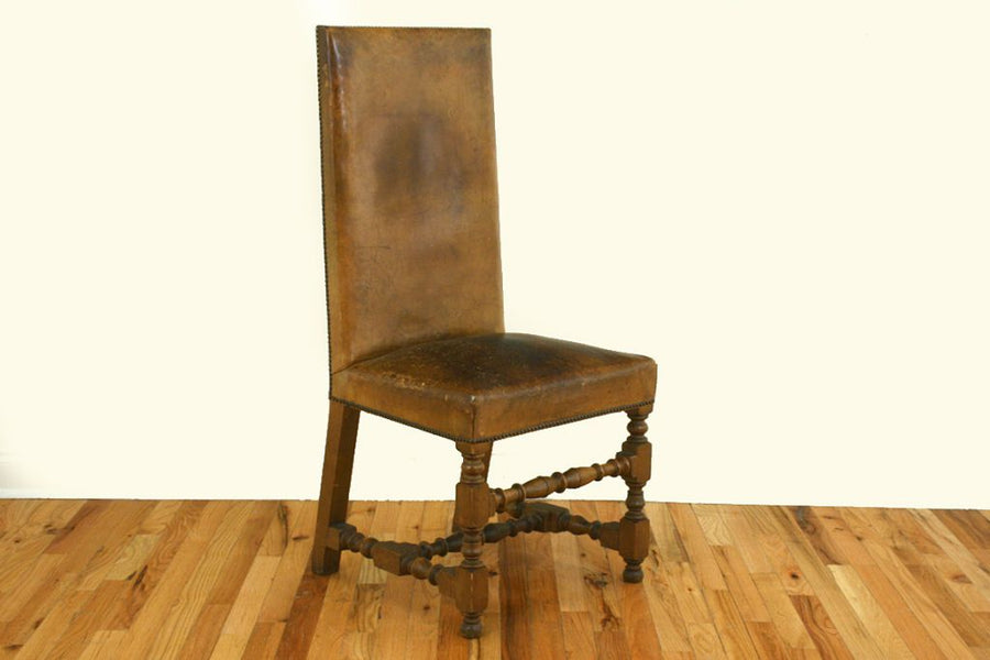 Four Walnut and Leather Upholstered Dining Chairs