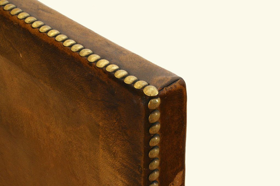 Four Walnut and Leather Upholstered Dining Chairs