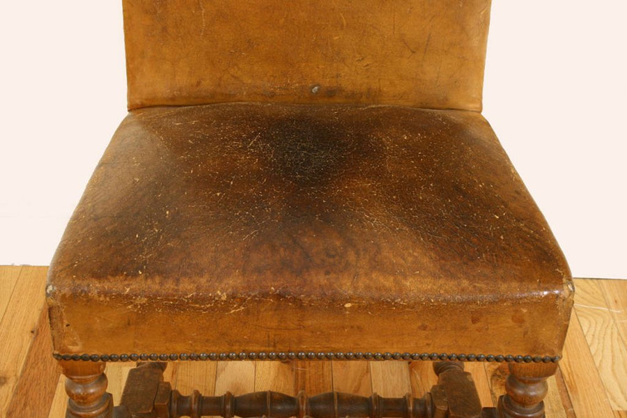 Four Walnut and Leather Upholstered Dining Chairs