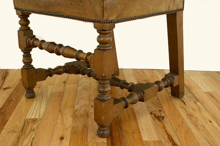 Four Walnut and Leather Upholstered Dining Chairs