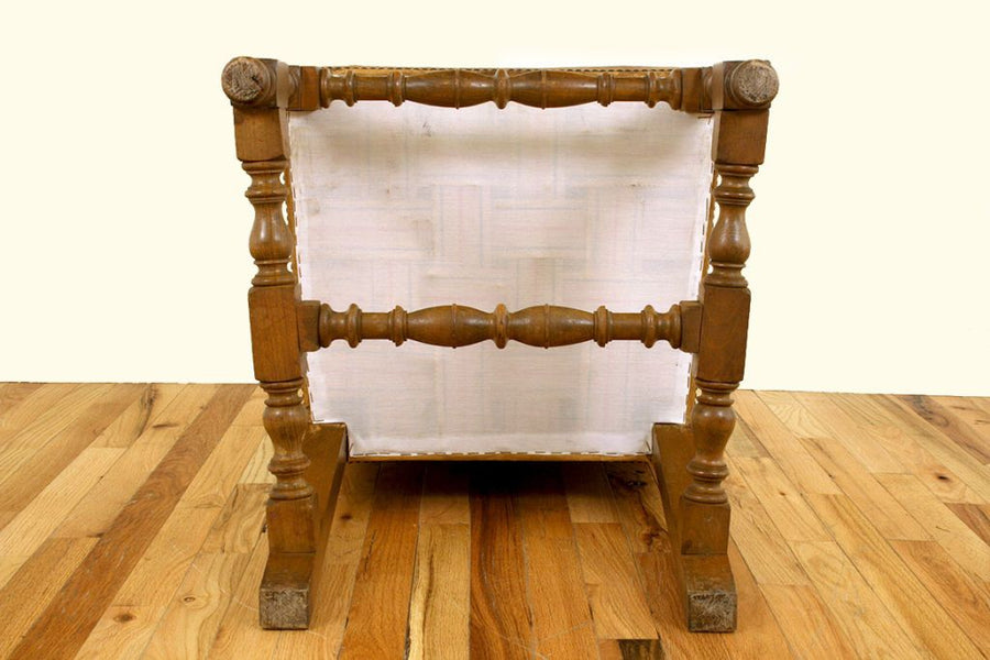 Four Walnut and Leather Upholstered Dining Chairs