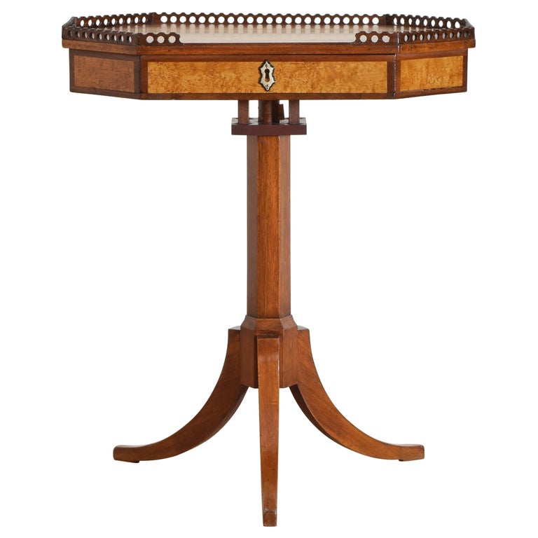 Galleried Swivel Work Table in Maple and Walnut