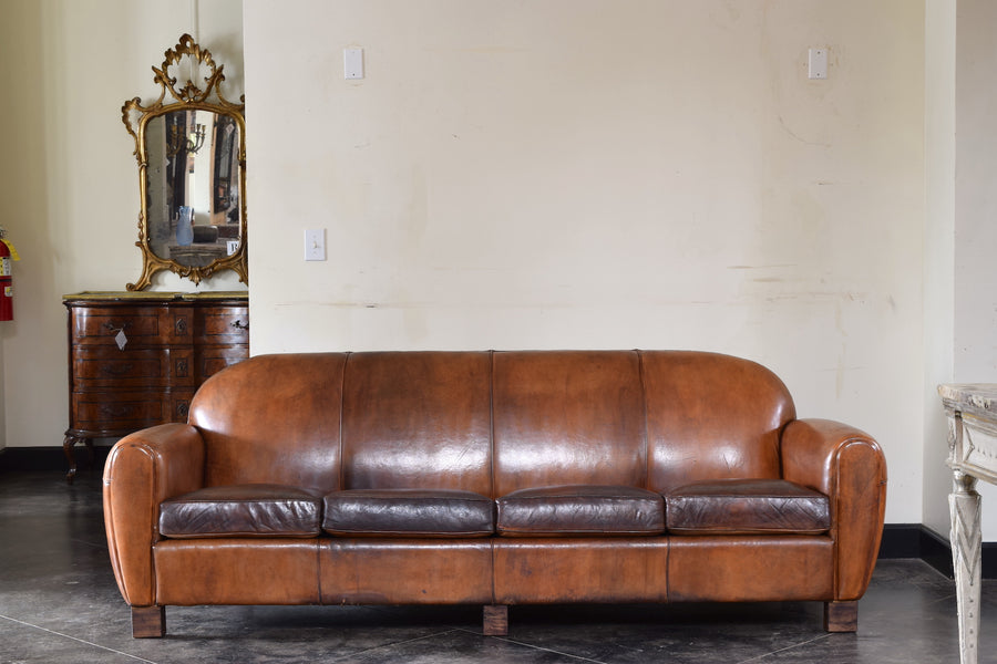 Leather Upholstered Four Cushion Sofa