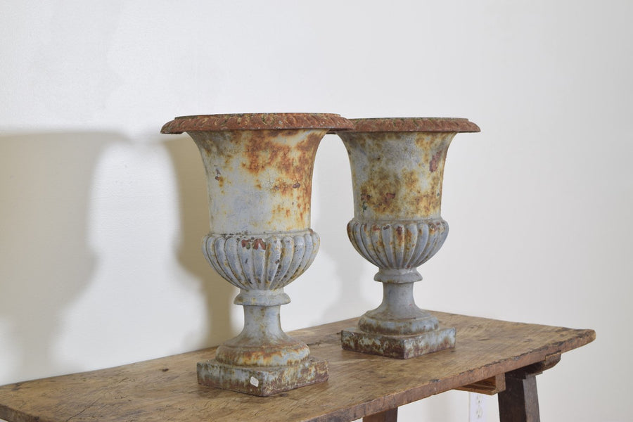 Pair Cast Iron and Parcel Painted Campana Form Urns